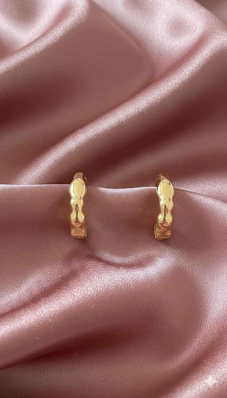 Boucles d'oreilles créoles dorées ondulées