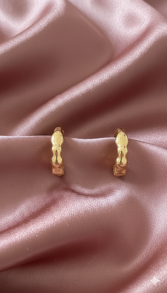 Boucles d'oreilles créoles dorées ondulées