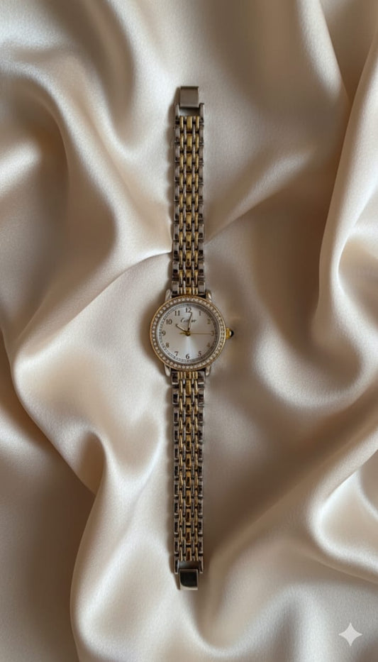 Montre Cartier bicolore avec cadran blanc et strass